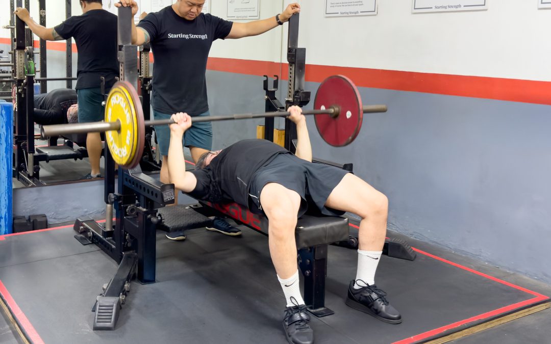 Should You Tuck or Flare Your Elbows When You Bench Press? Neither.